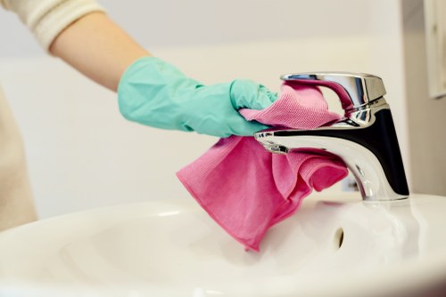 Spot cleaning a rug stain with a cloth and gentle solution